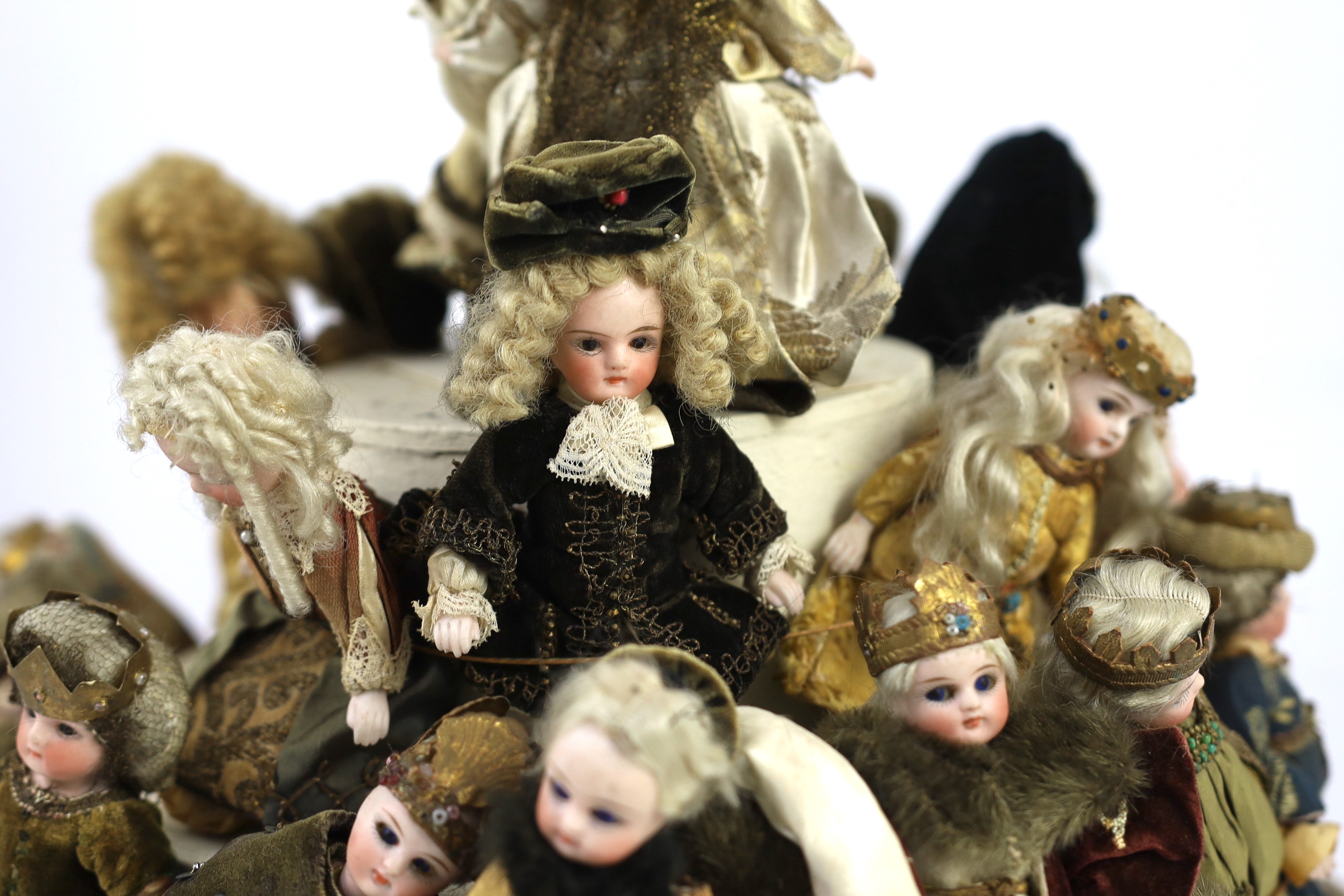 A rare collection of twenty-three German all-bisque dolls, circa 1910